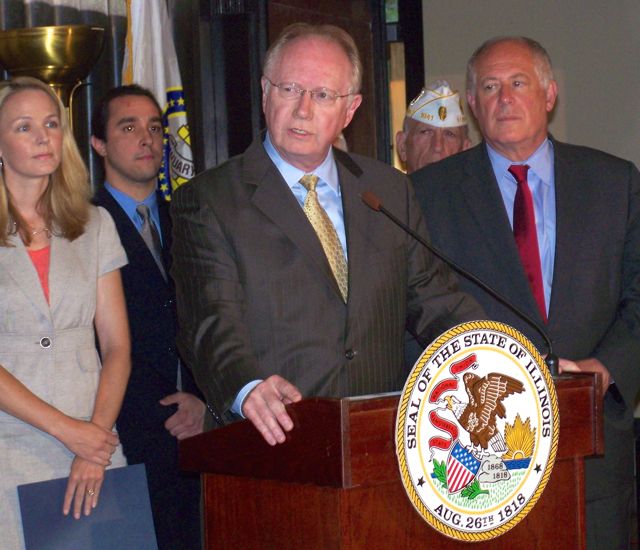 Illinois Supreme Court Chief Justice Kilbride (left) spoke during a recent news conference at the Leighton Criminal Court Building in Chicago. Governor Pat Quinn (pictured right) signed into law on August 15 House Bill 3111, the "Access to Justice Act" that establishes two pilot projects: one creating a statewide military personnel and veterans' legal assistance hotline and a program to provide court-based legal assistance within a circuit court in each of the five Appellate Court districts in the state. 