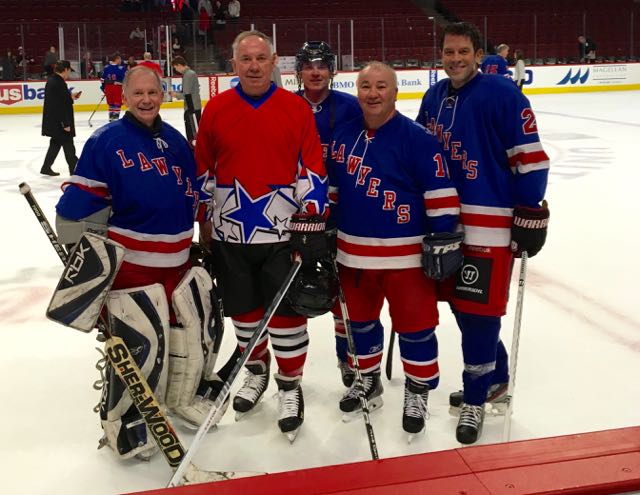 From left:  Bishop Thomas John Paprocki, Blackhawks' legend Cliff Koroll, C.J. Koroll (Cliff's son), Attorney Steve Demitro and CBS 2 Anchor Rob Johnson