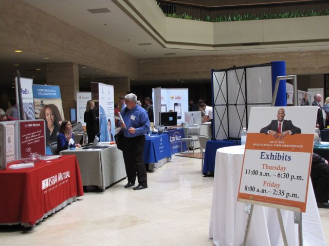 The exhibitor hall in the atrium of the Westin Chicago Northwest.